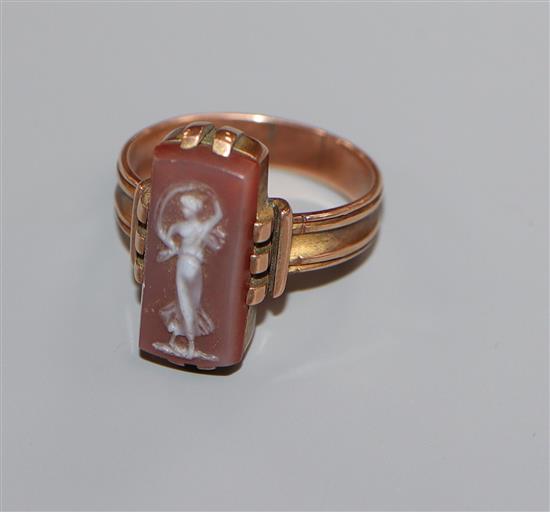A 19th century yellow metal and carved sardonyx cameo ring, size P/Q.